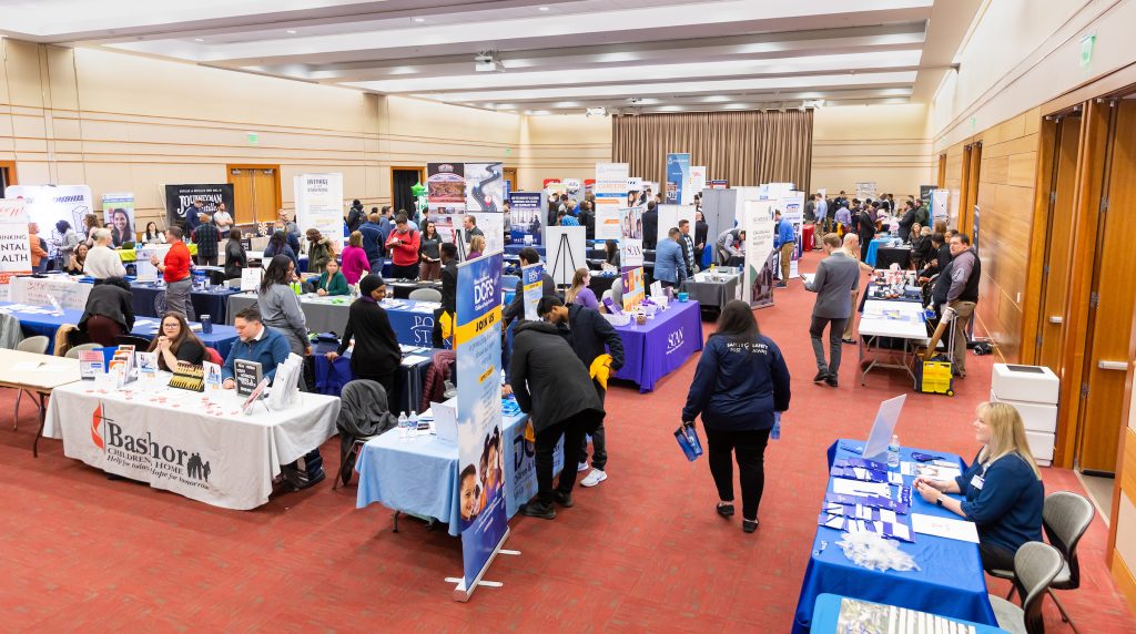 Active Event On campus with many business tables set up.