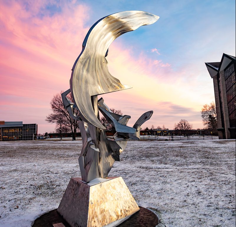 Valpo Statue in front of the VUCA with a pretty sky in the background.