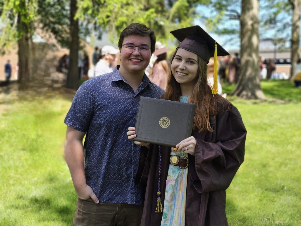 Valparaiso University physics and mathematics student Lane Scheel '25 and girlfriend smiling.