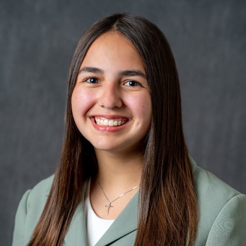 Valparaiso University bionengineering student Ashley Velasquez '25 smiles in professional attire.